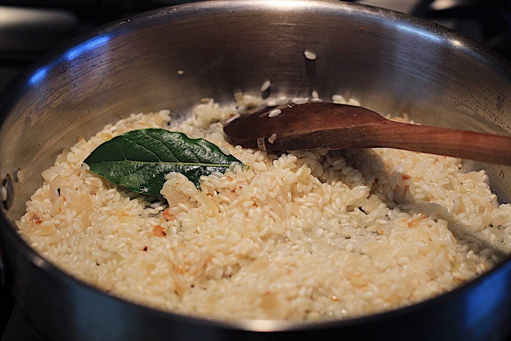 Sautéing Rice And Bay Leaf For Risotto