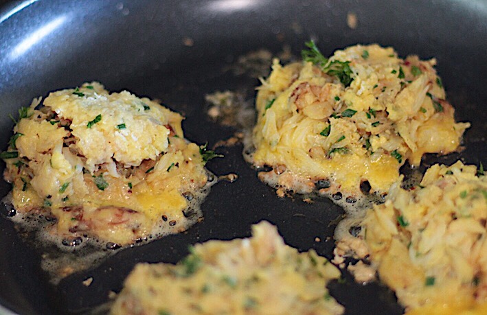 Crab Cakes Cooking in a frying pan