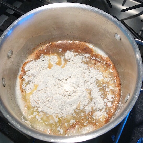 Add flour mixture to hot water and butter