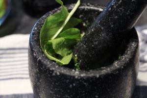 Making Sorrel Pesto With A Mortar And Pestle