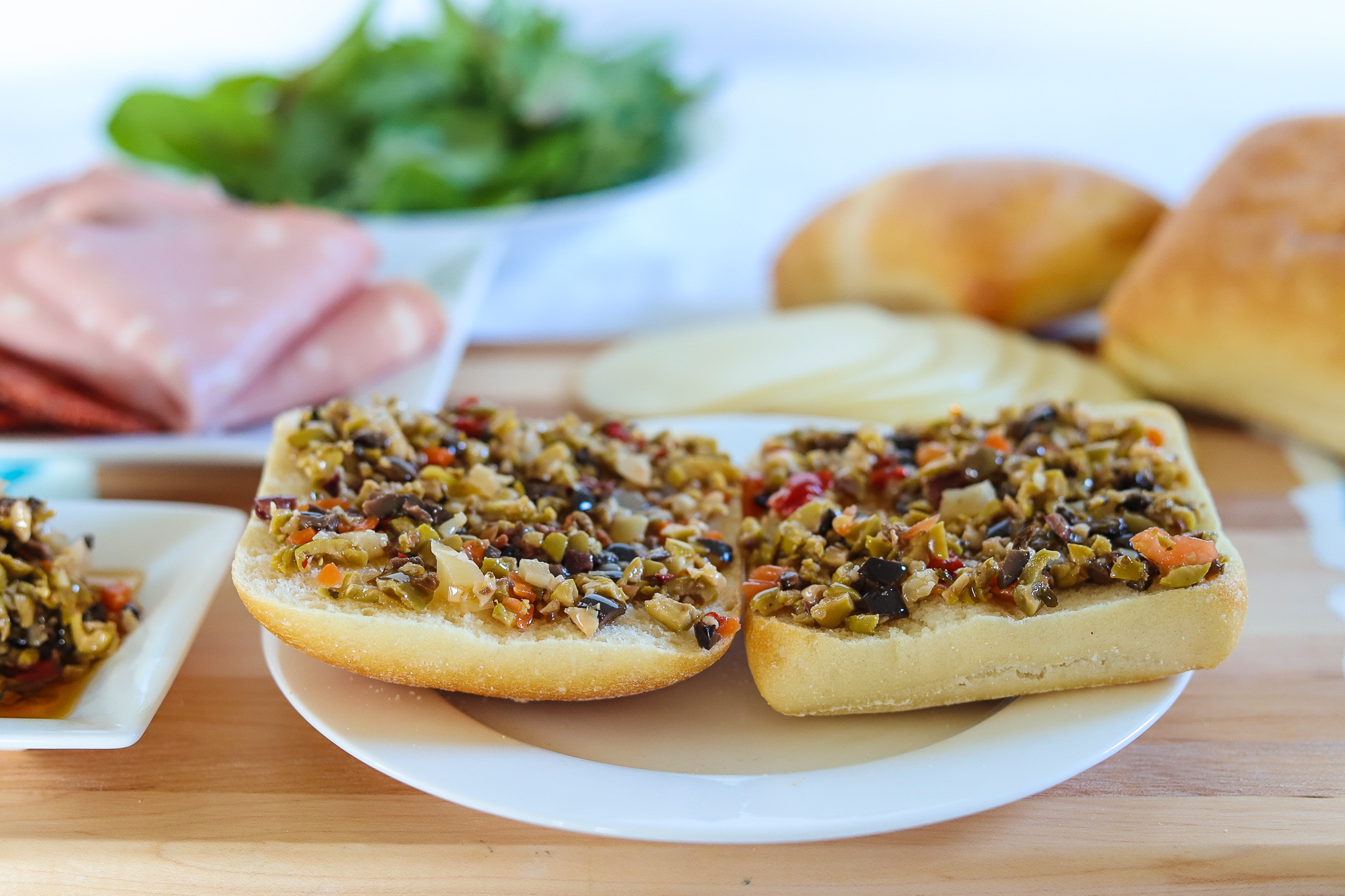 Olive Bruschetta spread on bread for muffuletta recipe