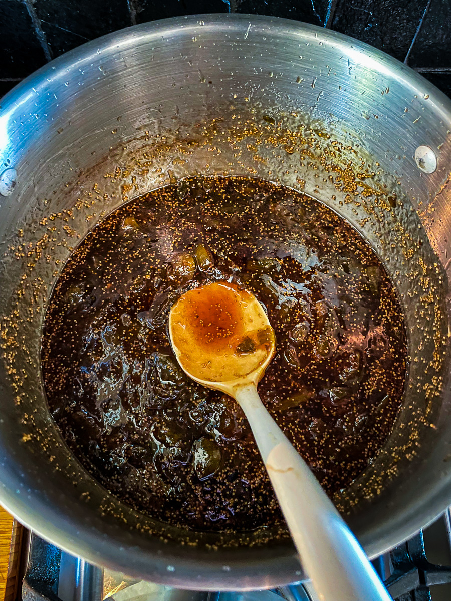 The figs and balsamic have cooked down into a thick jam that is a dark burgundy color in the pot