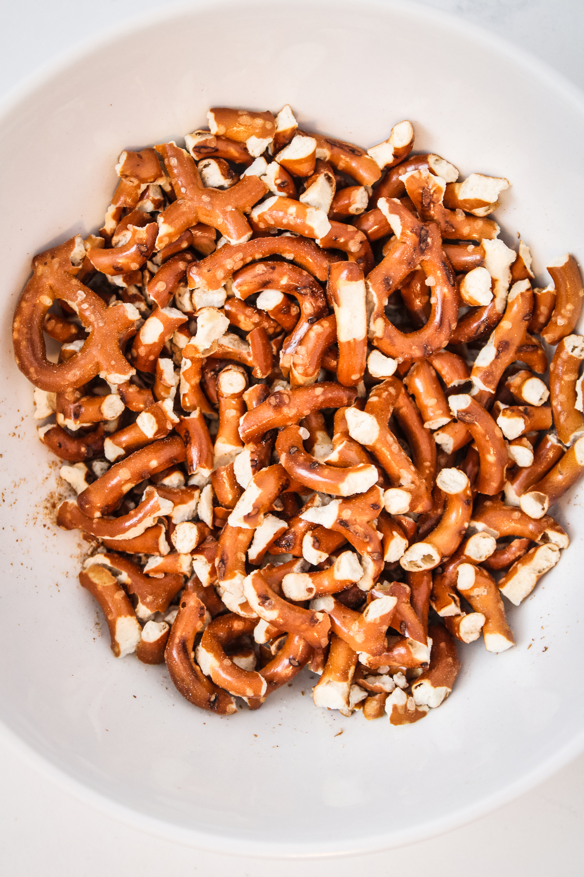 Crushed pretzels in a bowl ready to be added.