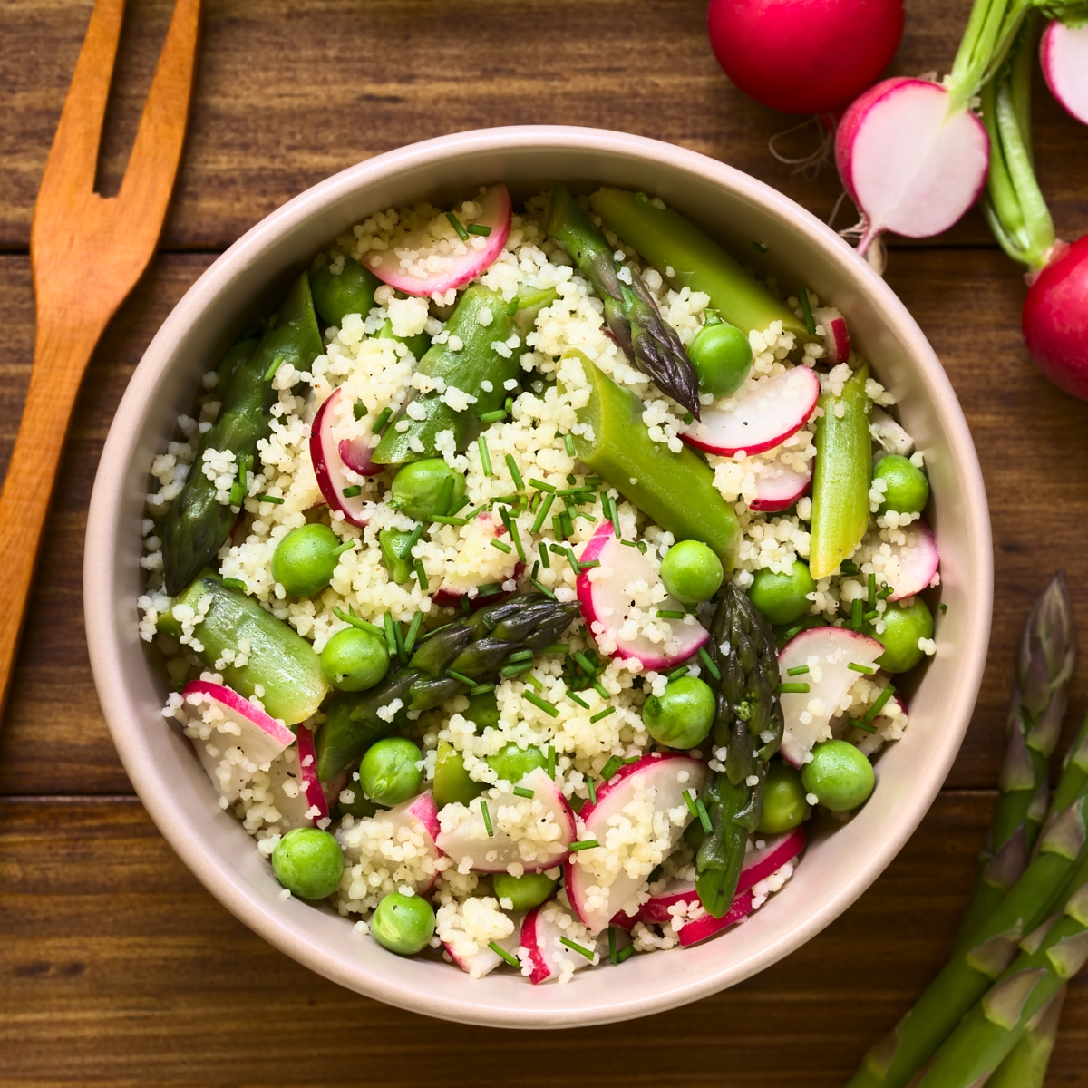 Rice with green peas, sliced radishes and asparagus.