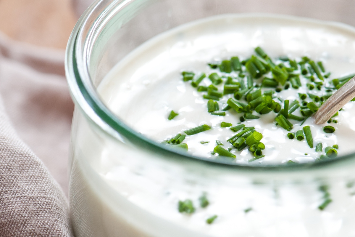 Creamy white dip topped with finely snipped green chives.