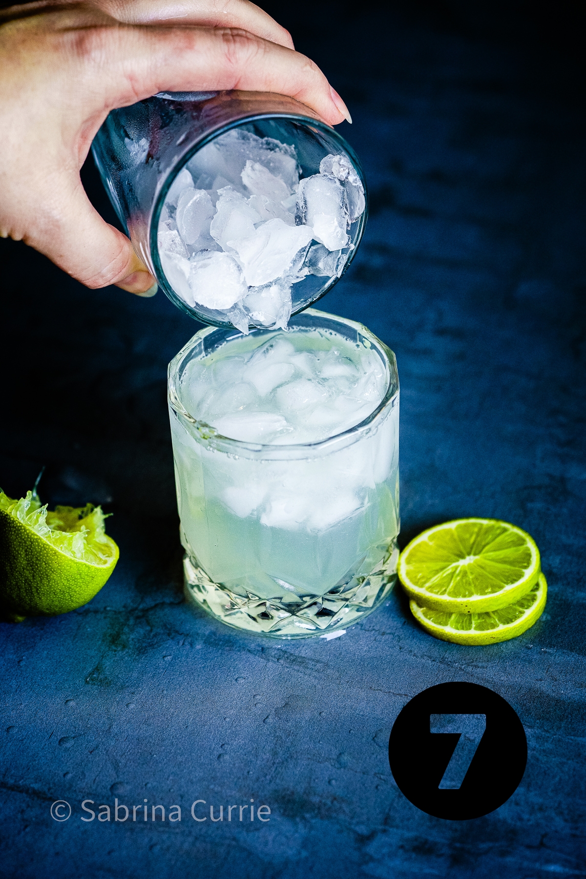 Step 7: pouring crushed ice into a rocks glass