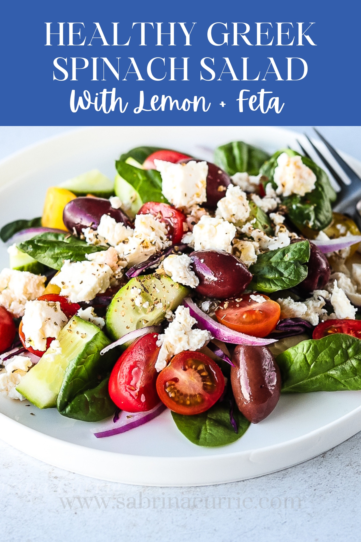 Tall Pinterest graphic with title, Healthy Greek spinach salad with lemon + feta, in white on blue banner and photo of Greek spinach salad below.