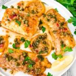 Crispy cod filets topped with lemon and capers.