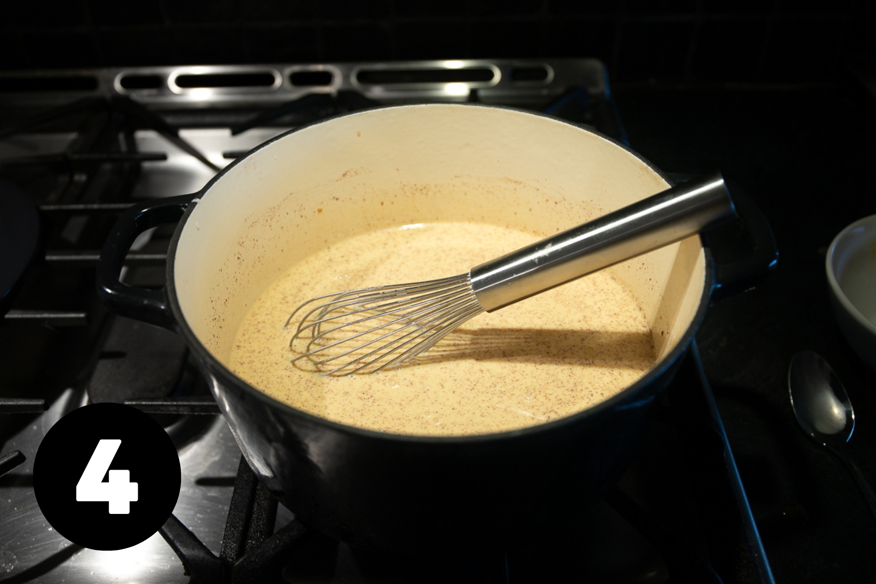 The slightly thickened creamy eggnog has a homogenous look now and the spices are evenly blended throughout.