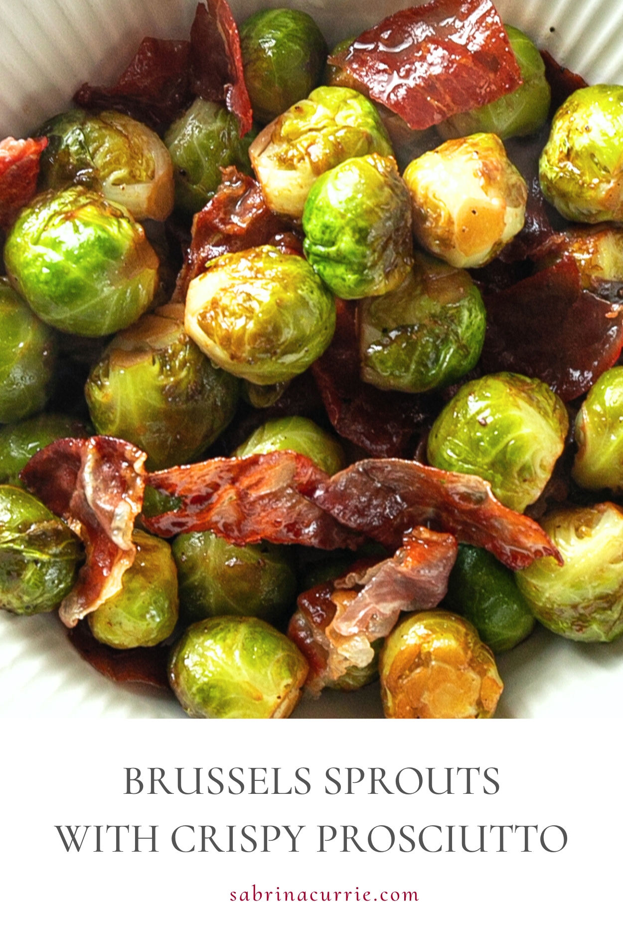 Bowl of glazed Brussels sprouts mixed with chunks of crispy prosciutto.