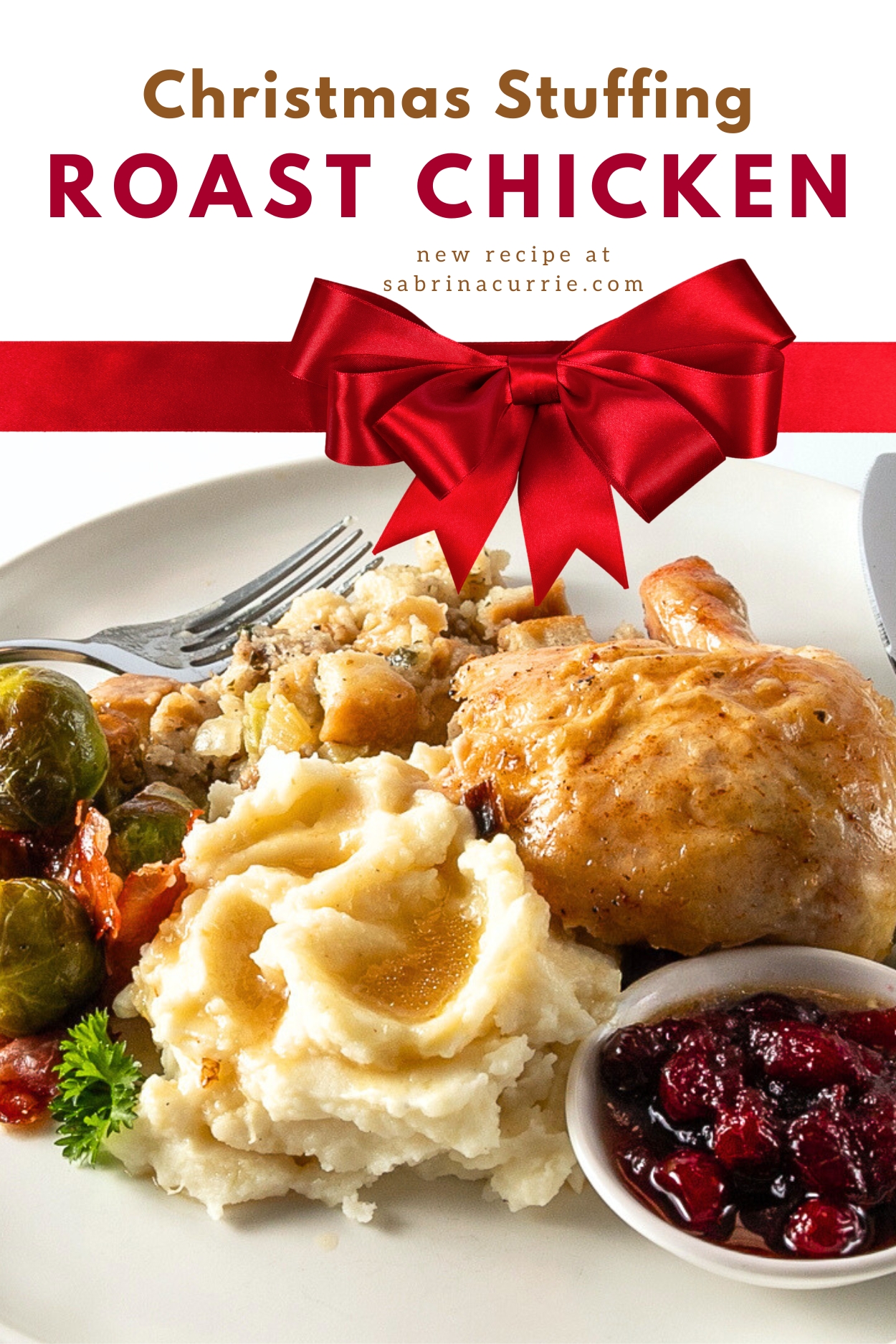 A plate of roast chicken, mashed potatoes with gravy and cranberry sauce.