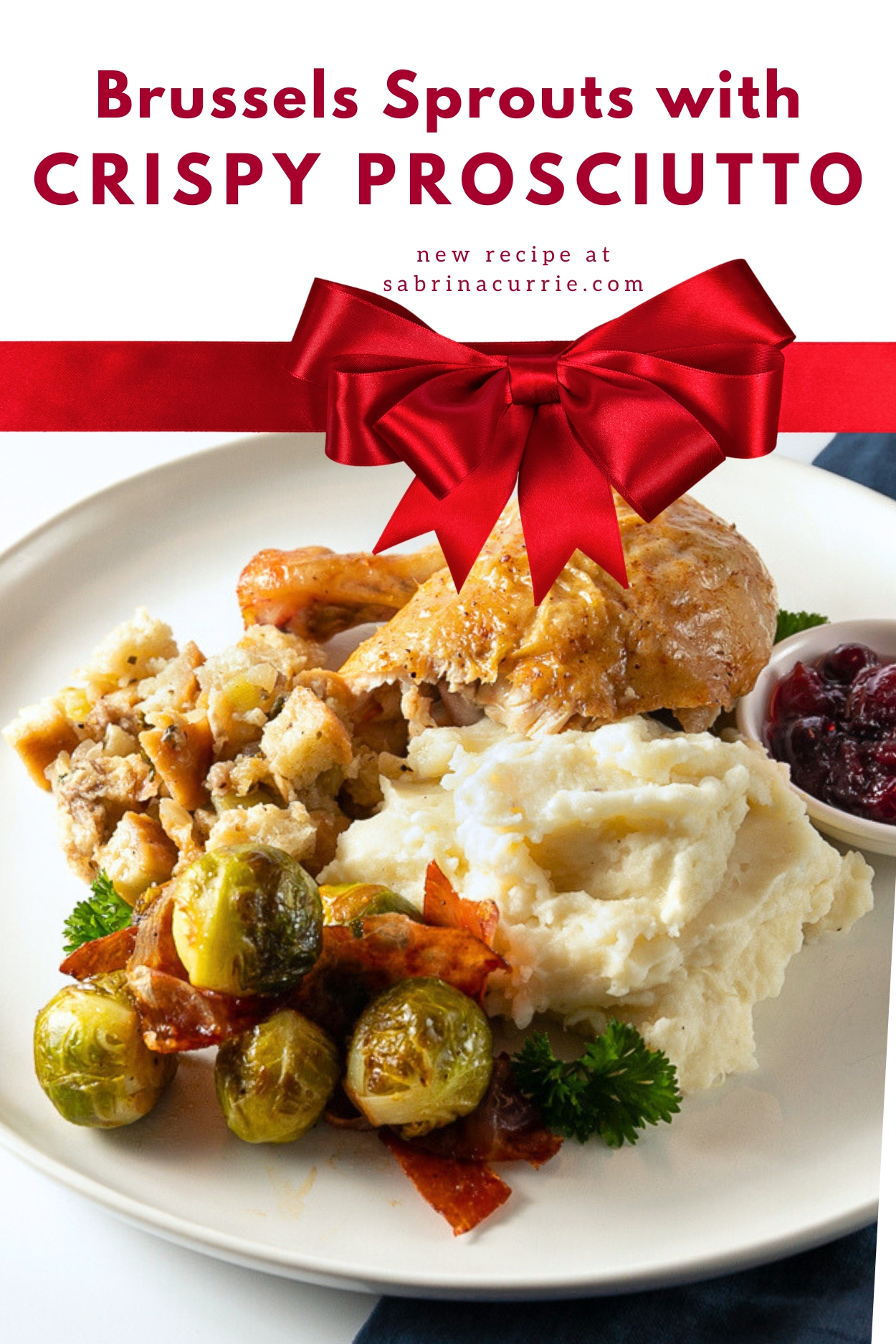 A classic Christmas dinner plate with mashed potatoes, Brussels sprouts, turkey and dressing with a side dish of cranberry sauce.