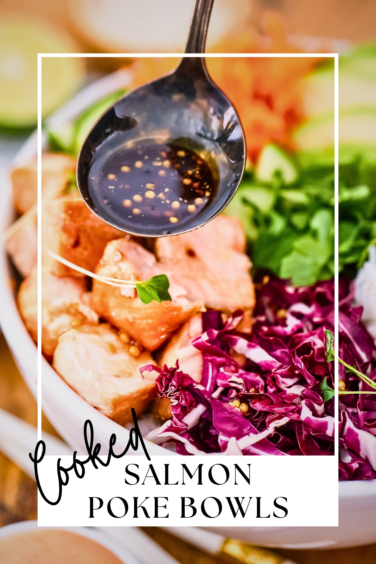 A spoon drizzling poke sauce over chopped veggies and salmon in a bowl.