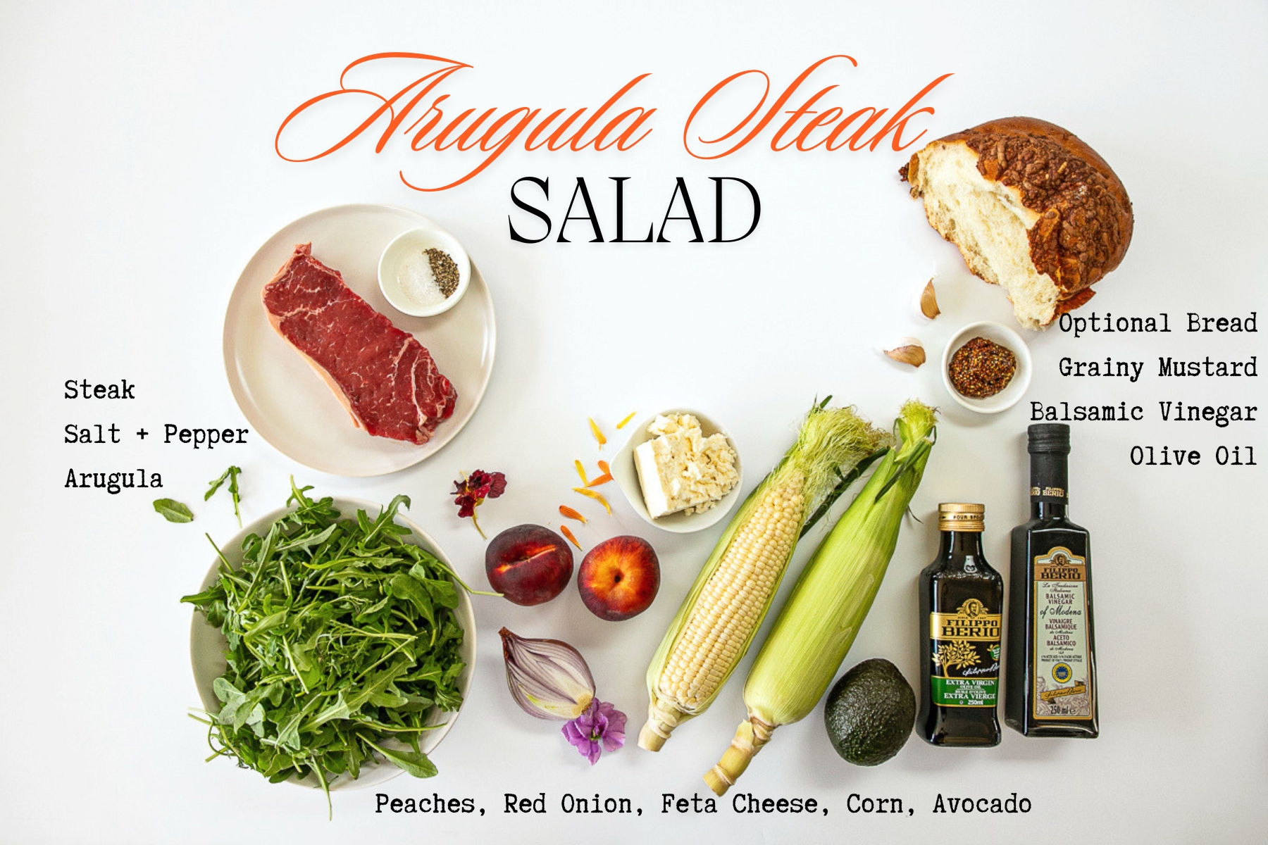 Ingredients for arugula steak salad with peaches, flank steak, fresh corn, and avocado on a kitchen counter.
