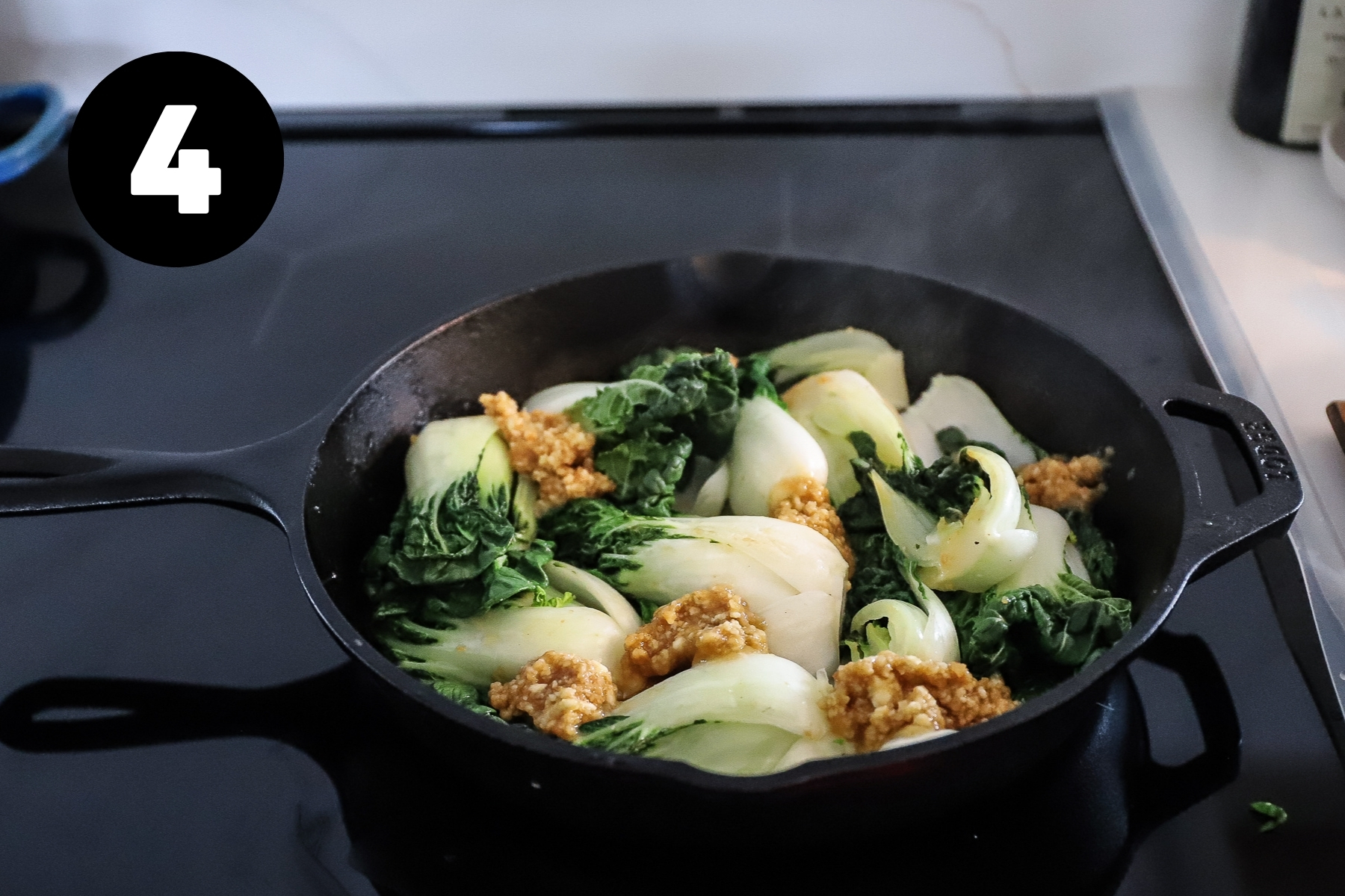 Miso added between the bok choy pieces.